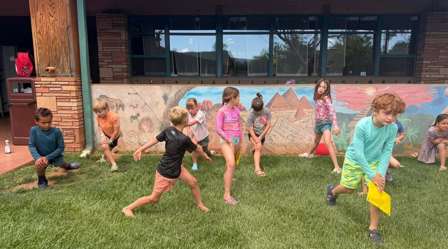 Campers playing games outdoors at Sedona Camp