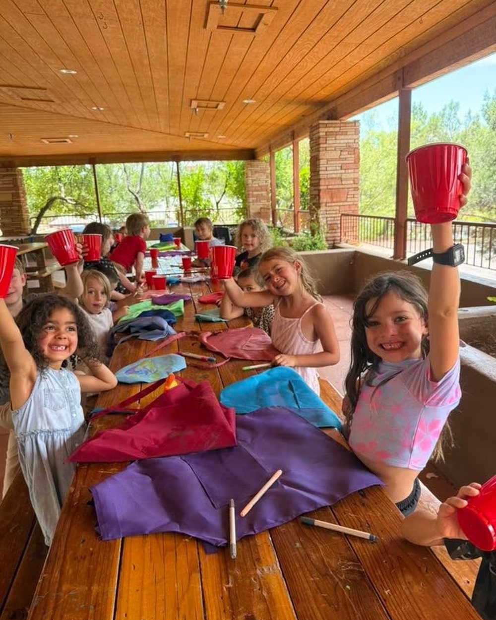 Campers celebrating a craft project